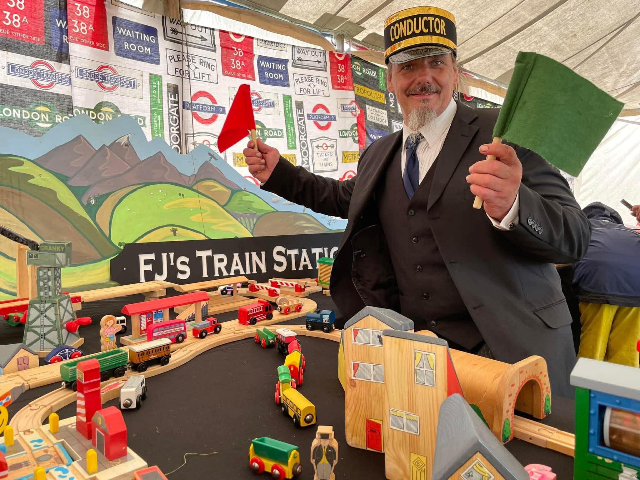 trains in the Fiery Jack tents with conductor